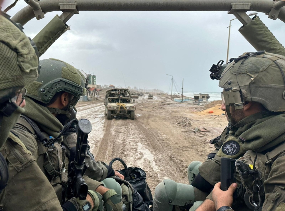 Israeli soldiers operate in the Gaza Strip, after a temporary truce expired between Israel and the Palestinian Islamist group Hamas, in this handout picture released on December 2, 2023. — Israel Defence Forces handout pic via Reuters