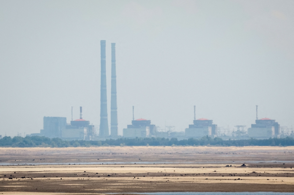 A view shows Zaporizhzhia Nuclear Power Plant from the bank of Kakhovka Reservoir near the town of Nikopol. ― Reuters pic