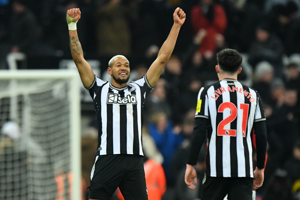Newcastle United's Brazilian striker #07 Joelinton celebrates on the final whistle in the English Premier League football match between Newcastle United and Manchester United at St James' Park in Newcastle-upon-Tyne, north east England on December 2, 2023. — AFP pic