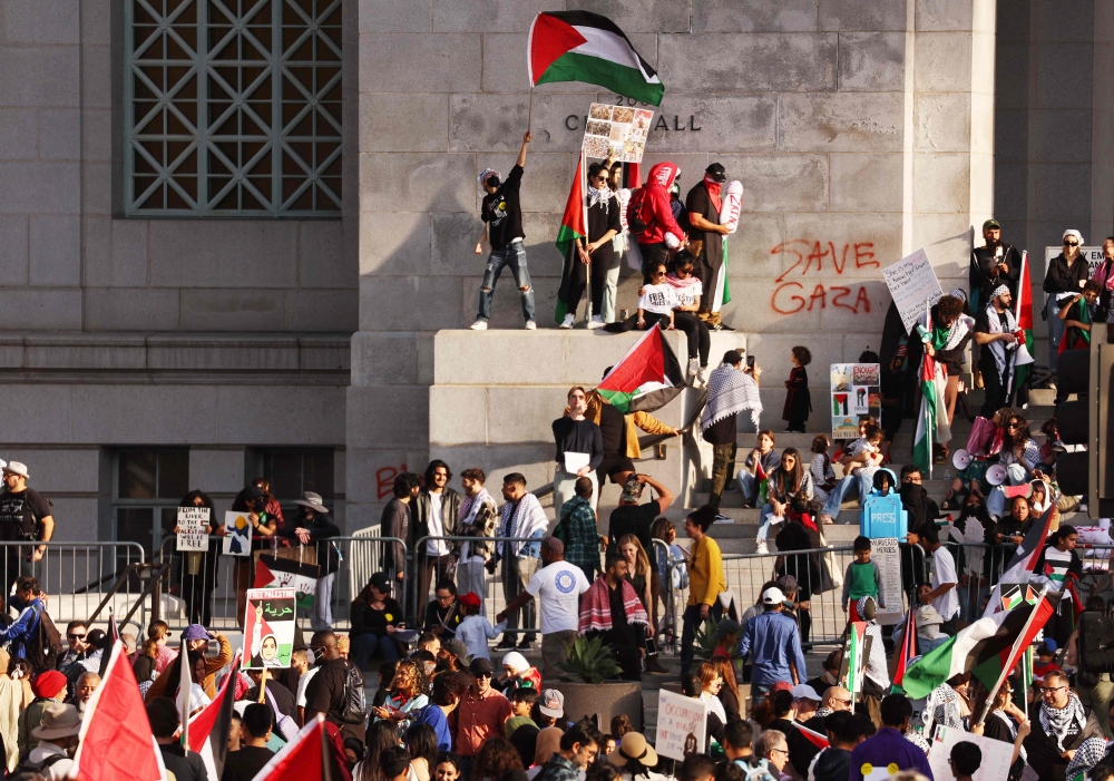A pro-Palestine demonstration in Los Angeles. Gazan health authorities have said that over 15,000 have been killed by Israeli bombings since October 7. — AFP pic