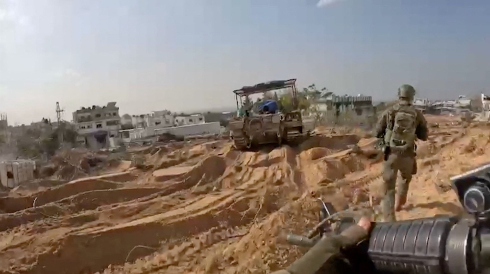 Members of the Israeli army operate in a location given as Gaza, amid the ongoing conflict between Israel and the Palestinian Islamist group Hamas, in this still image obtained from a handout video released December 3, 2023. — Israel Defence Forces handout via Reuters pic