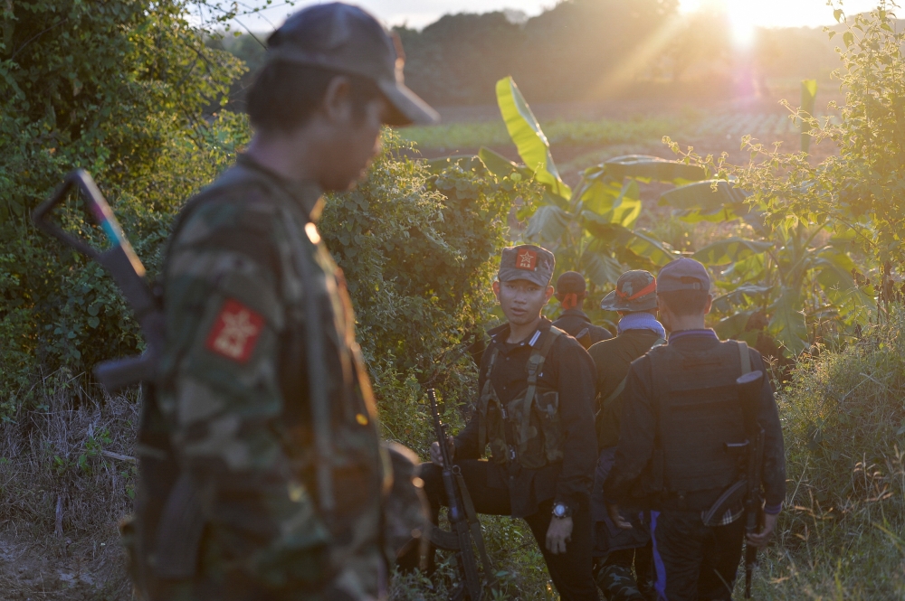People's Liberation Army forces walk near Sagaing Region in Myanmar November 23, 2023. — Reuters pic