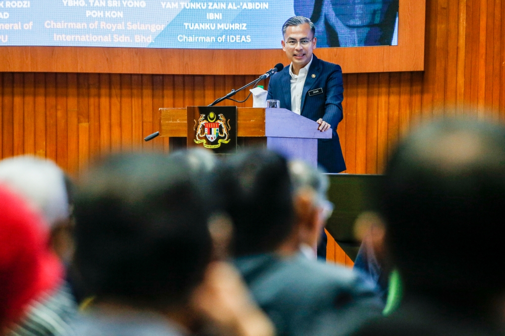 Communications and Digital Minister Fahmi Fadzil delivers a speech at the National Institute of Public Administration in Kuala Lumpur December 4, 2023. — Picture by Hari Anggara