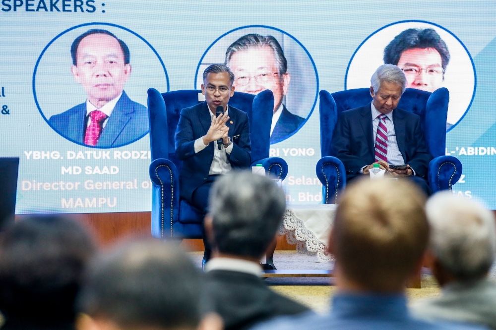 Communications and Multimedia Minister Fahmi Fadzil said the government is not yet ready to bring the proposed amendment to the CMA to Parliament. —Picture by Hari Anggara