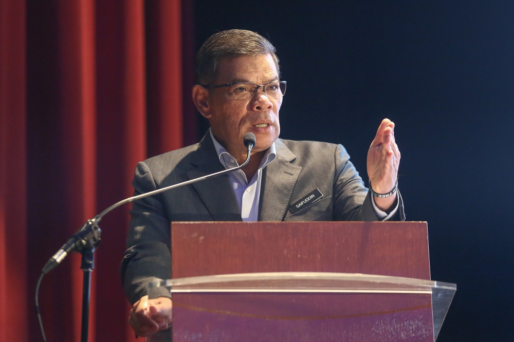 Home Minister Datuk Seri Saifuddin Nasution Ismail speaks during the one year KDN Madani celebrations and Home Ministry’s monthly assembly at Kompleks Setia Perkasa in Putrajaya  December 4, 2023. — Picture by Yusof Mat Isa