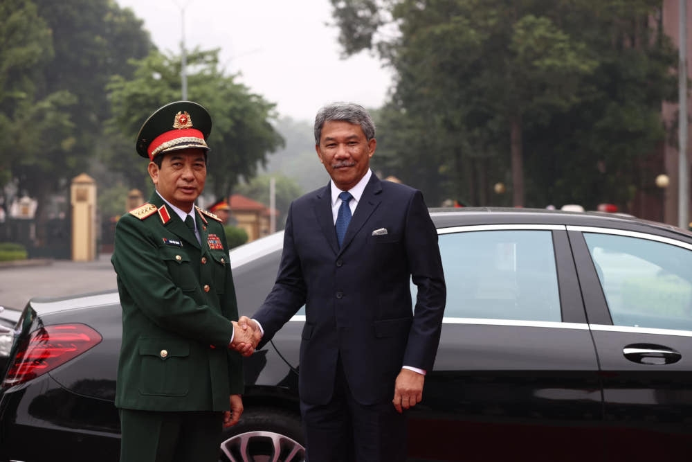 Defence Minister Datuk Seri Mohamad Hasan with his counterpart, Vietnam’s Minister of National Defence, General Phan Van Giang, during his two-day working visit to Vietnam which began today. — Picture from Facebook/Dato’ Seri Utama Haji Mohamad Bin Haji Hasan