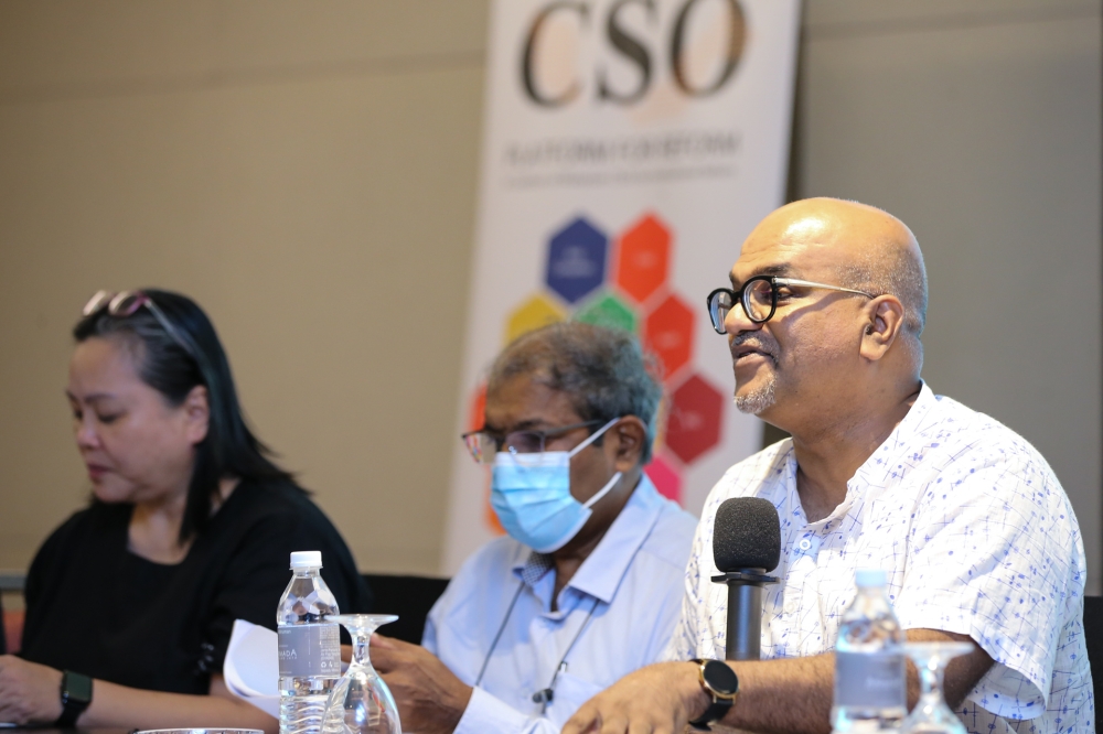CSO Platform for Reform chairman Jerald Joseph (right) speaks during a press conference on ‘One Year of the Unity Government of Malaysia’ at a hotel in Petaling Jaya December 4, 2023. —  Picture by Ahmad Zamzahuri
