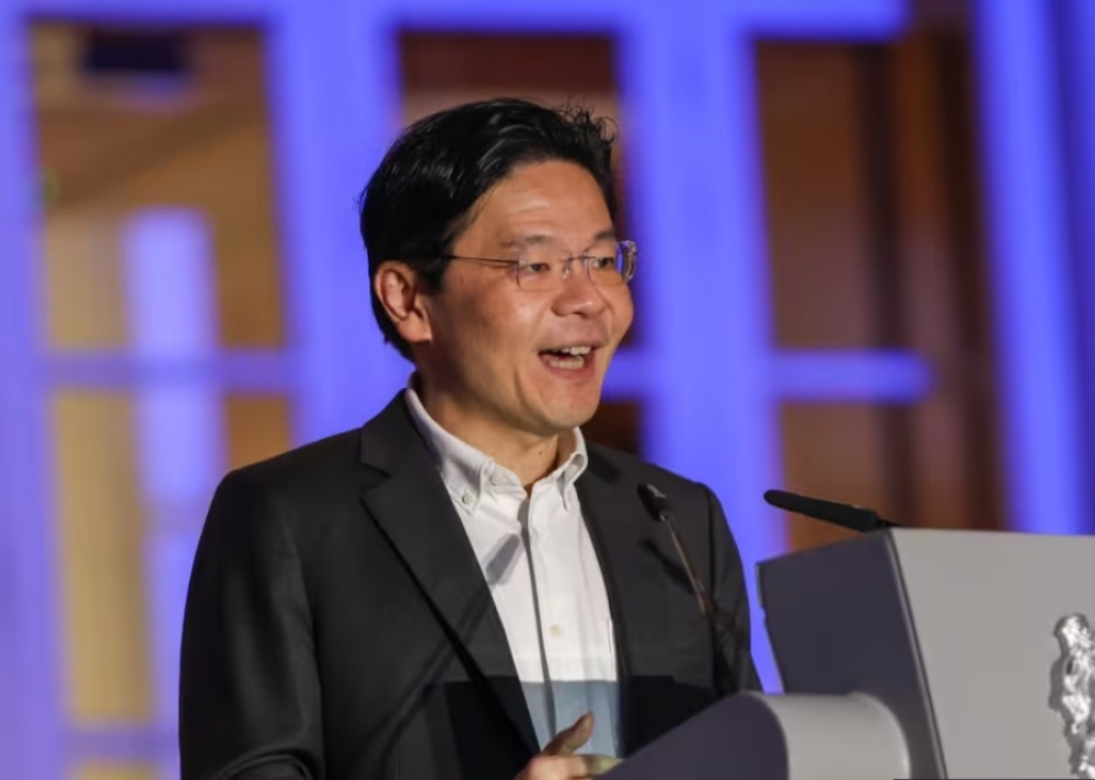 Singapore’s Deputy Prime Minister Lawrence Wong speaking at the Singapore Conference on AI in Singapore December 4, 2023. — TODAY pic