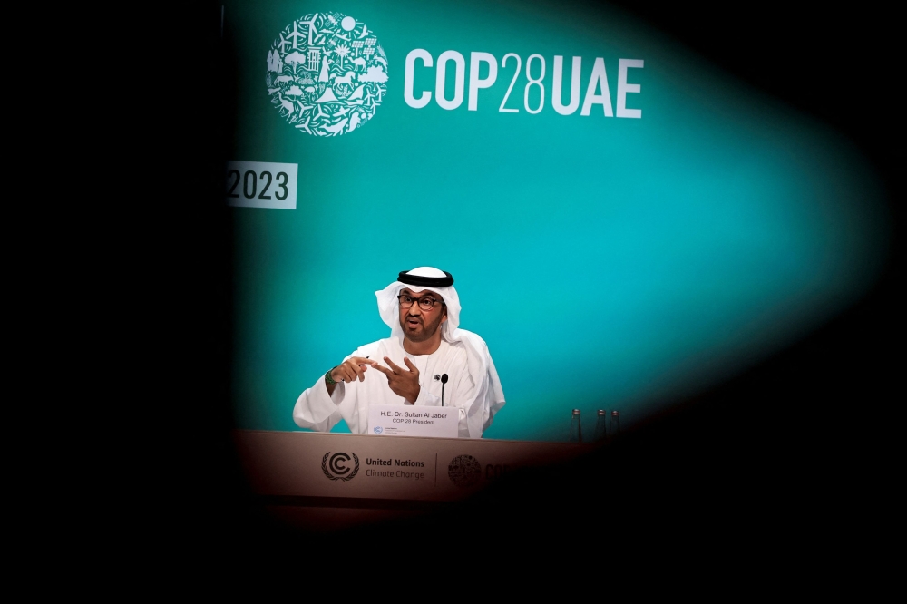 United Arab Emirates Minister of Industry and Advanced Technology and COP28 President Sultan Ahmed Al Jaber speaks during a press conference at the United Nations Climate Change Conference (COP28) in Dubai December 4, 2023. — Reuters pic