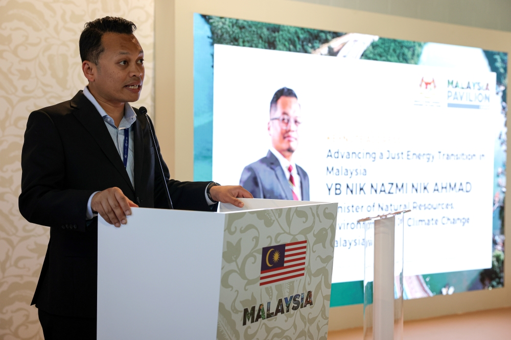 Natural Resources, Environment and Climate Change Minister Nik Nazmi Nik Ahmad delivers his keynote address on ‘Advancing a Just Energy Transition in Malaysia’ before the Energy Day Launch and Soft Launch of the International Sustainable Energy Summit (ISES) 2024 at the Malaysia Pavilion during the 28th Conference of Parties (COP28) to the United Nations Framework Convention on Climate Change, Dubai Expo City December 4, 2023. — Bernama pic