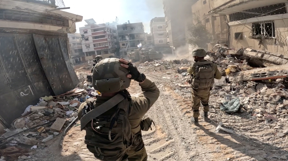 Israeli soldiers operate in the Gaza Strip amid the ongoing conflict between Israel and the Palestinian Islamist group Hamas, in this screen grab taken from a handout video released on December 4, 2023. — Israel Defense Forces/Handout via Reuters pic