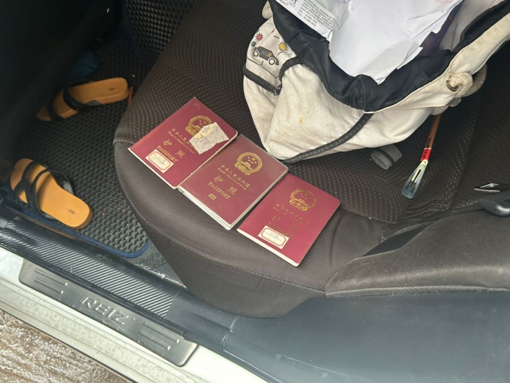 The forged China passports that were recovered by the Johor Immigration Department following the operation in Taman Nusa Bestari in Johor Baru yesterday. — Picture courtesy of the Johor Immigration Department 