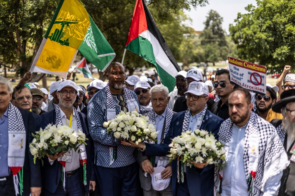 Senior Hamas officials today joined the family of Nelson Mandela to mark the 10th anniversary of his death and cast the spotlight on the bitter conflict in Gaza. — AFP pic