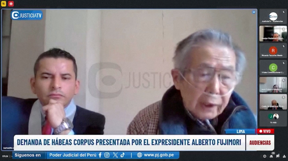 Judge Nestro Paredes listens as former Peruvian President Alberto Fujimori speaks during a digital hearing, in Lima, Peru October 4, 2023, in this screen grab obtained from a video. — Picture courtesy of Peruvian Justice TV/Handout via Reuters