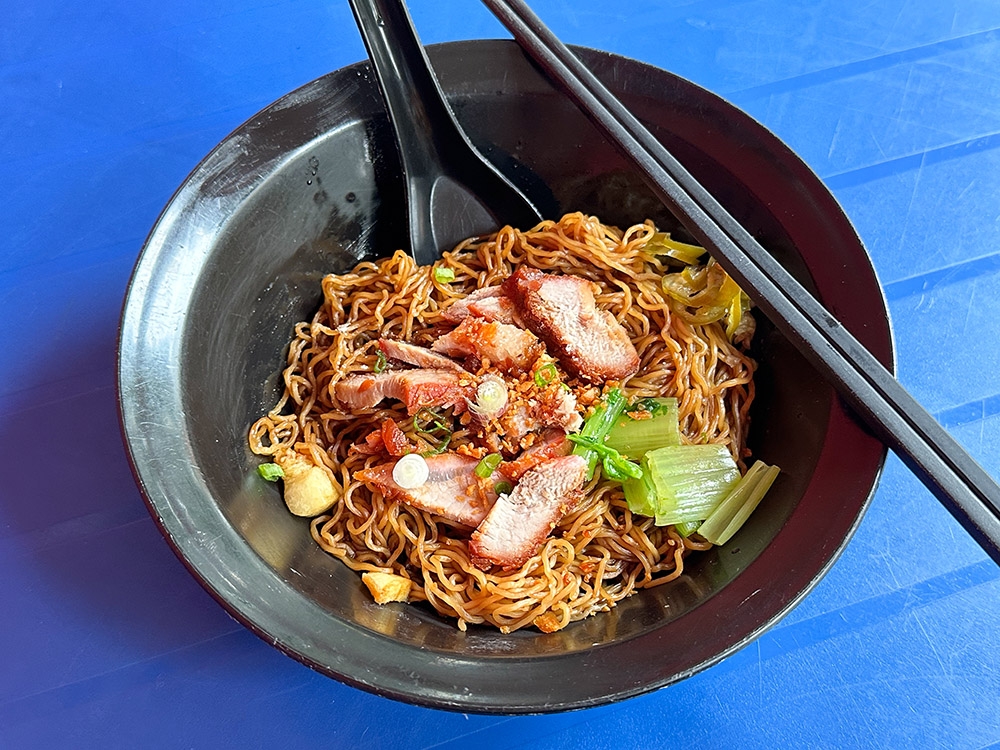 Head to this stall selling cheap and tasty 'wantan mee' and pork noodles in Brickfields