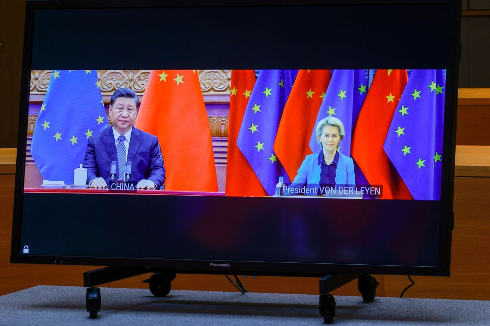 Chinese President Xi Jinping and European Commission President Ursula von der Leyen speak with European Council President Charles Michel and European Union foreign policy chief Josep Borrell via video conference during an EU China summit at the European Council building in Brussels in this file photo taken on April 1, 2022. China said today European Union export policies towards Beijing do not ‘make sense’, on the eve of a high-level summit in Beijing. — Olivier Matthys/Pool/Reuters pic