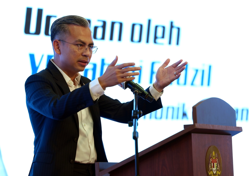 Minister of Communications and Digital Fahmi Fadzil said he has asked Mimos to open the MyDigital ID counter because many people seem to believe the conspiracy theories that the programme would involve the implantation of chips in the body and recording of fingerprints and iris scans of the users. — Bernama pic 
