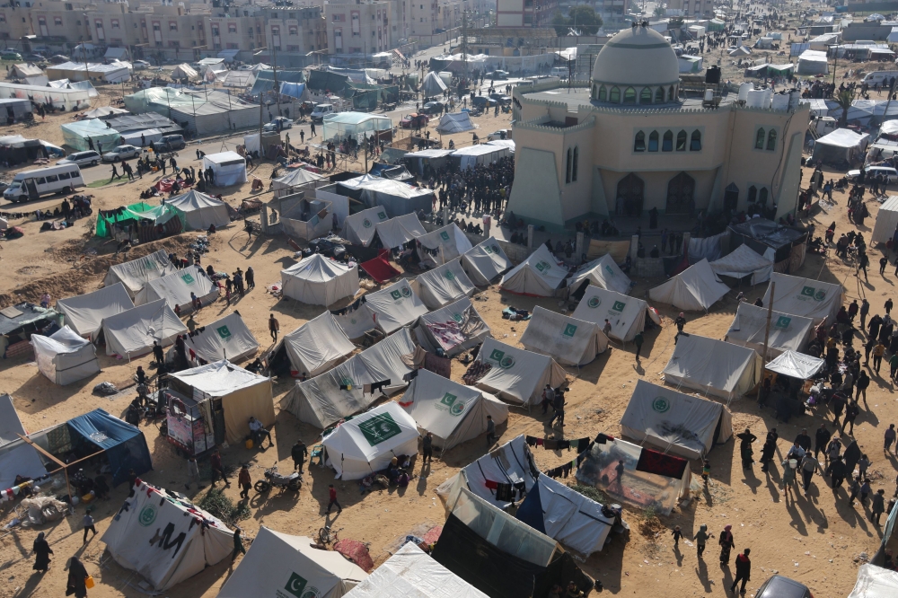 Displaced Palestinians, who fled their houses due to Israeli strike, shelter in a camp in Rafah, amid the ongoing conflict between Israel and resistance group Hamas, in the southern Gaza Strip, December 6, 2023. — Reuters pic 