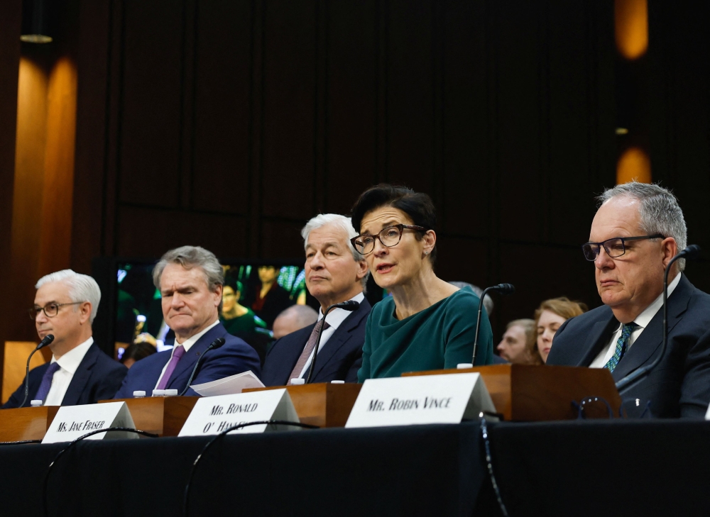 Citigroup CEO Jane Fraser speaks next to Wells Fargo CEO and President Charles W. Scharf, Bank of America Chairman and CEO Brian Thomas Moynihan, JPMorgan Chase Chairman and CEO Jamie Dimon and State Street CEO Ronald O’Hanley during the US Senate Banking, Housing and Urban Affairs Committee oversight hearing on Wall Street firms, on Capitol Hill in Washington December 6, 2023. — Reuters pic  