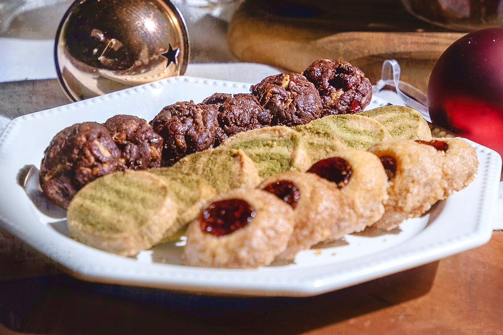 Festive cookies: Chocolate Cranberry Almond Cookies, Matcha Shortbread and Raspberry Thumbprints. – Picture courtesy of Universal Bakehouse