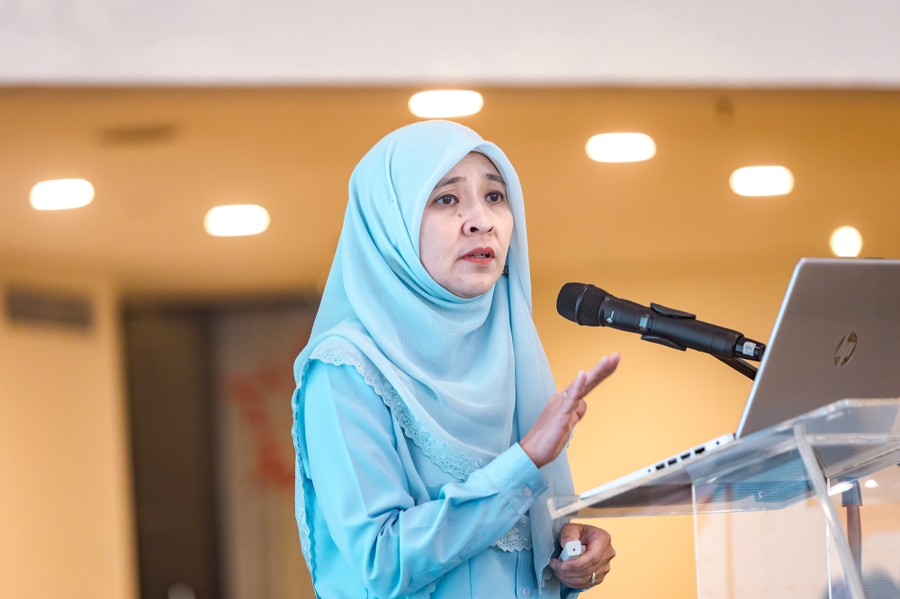 Suhakam Children’s Commissioner Farah Nini Dusuki speaks during the launch of 'Realising the Rights of Education for Refugee and Stateless Children in Malaysia' in Kuala Lumpur December 7, 2023. — Picture by Firdaus Latif