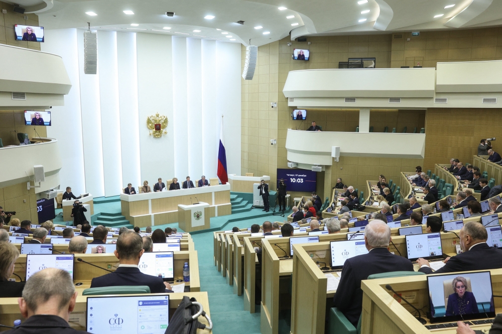 This handout picture taken and released by the Federation Council, the upper house of Russia's parliament, on December 7, 2023 shows senators attending a session in Moscow. Russia's upper house of parliament today set March 17, 2024 as the date for the next presidential election. — Russia’s Federation Council/AFP pic 