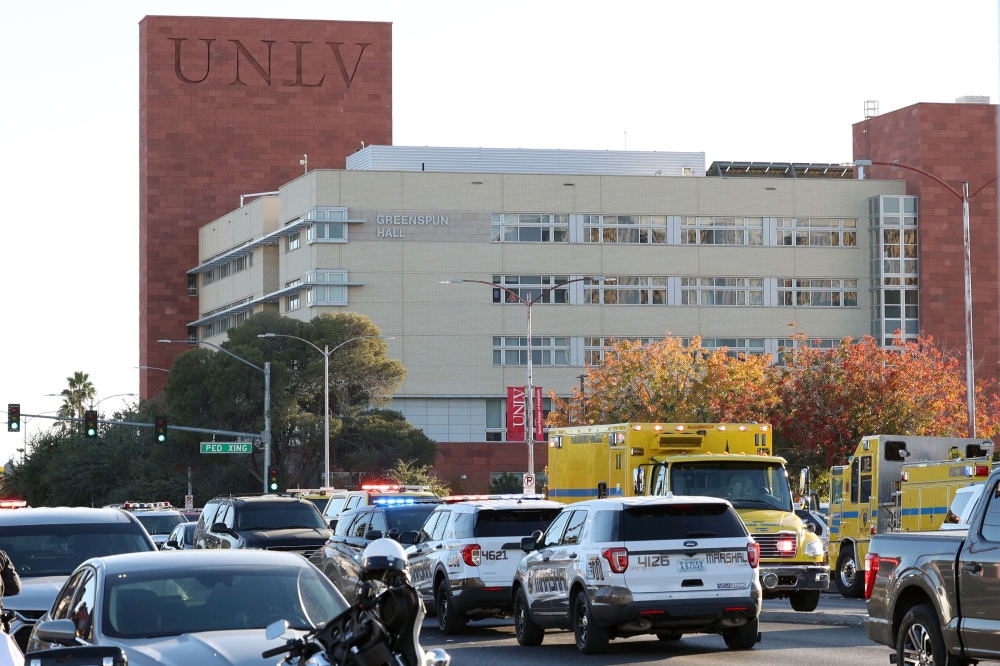 Emergency crews and law enforcement respond to a shooting at the University of Nevada, Las Vegas, campus in Las Vegas on December 6, 2023. The gunman who killed three people and injured another at the University of Nevada, Las Vegas was an academic who had applied for a professorship but was not hired, US media reported today. — AFP pic