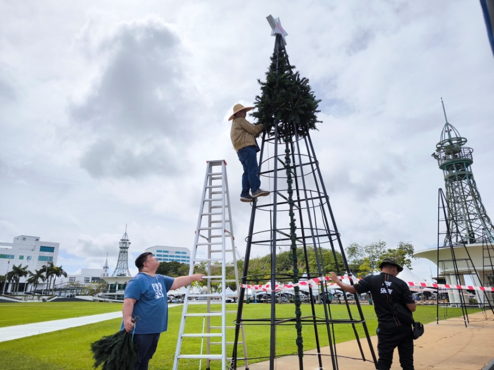 One of the Christmas trees being erected at the Dataran Tun Tuanku Bujang Phase 1. ― Picture by Peter Boon