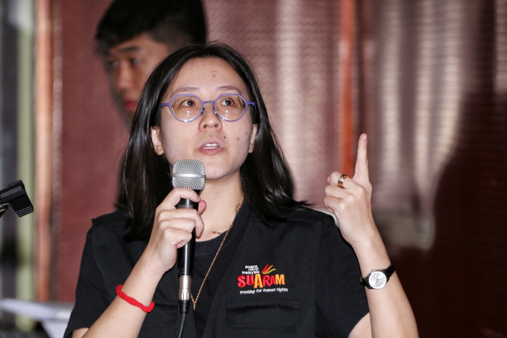 Jernelle Tan Chia Ee, Suaram’s documentation and monitoring coordinator, speaks during a news conference at the launch of the NGO’s Malaysia Human Rights Report 2023 Overview in Kuala Lumpur December 8, 2023. — Picture by Choo Choy May