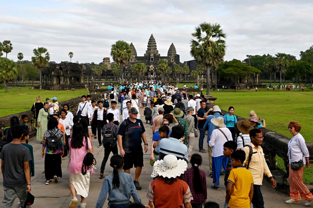 The popular temple complex dates back to the ninth century, and pre-pandemic it drew more than two million foreign visitors annually. — AFP pic