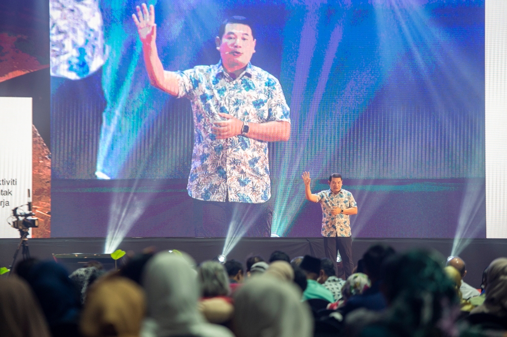 Economy Minister Rafizi Ramli delivers his speech during the Madani Government One Year Anniversary at Bukit Jalil National Stadium on December 8, 2023. — Picture by Shafwan Zaidon
