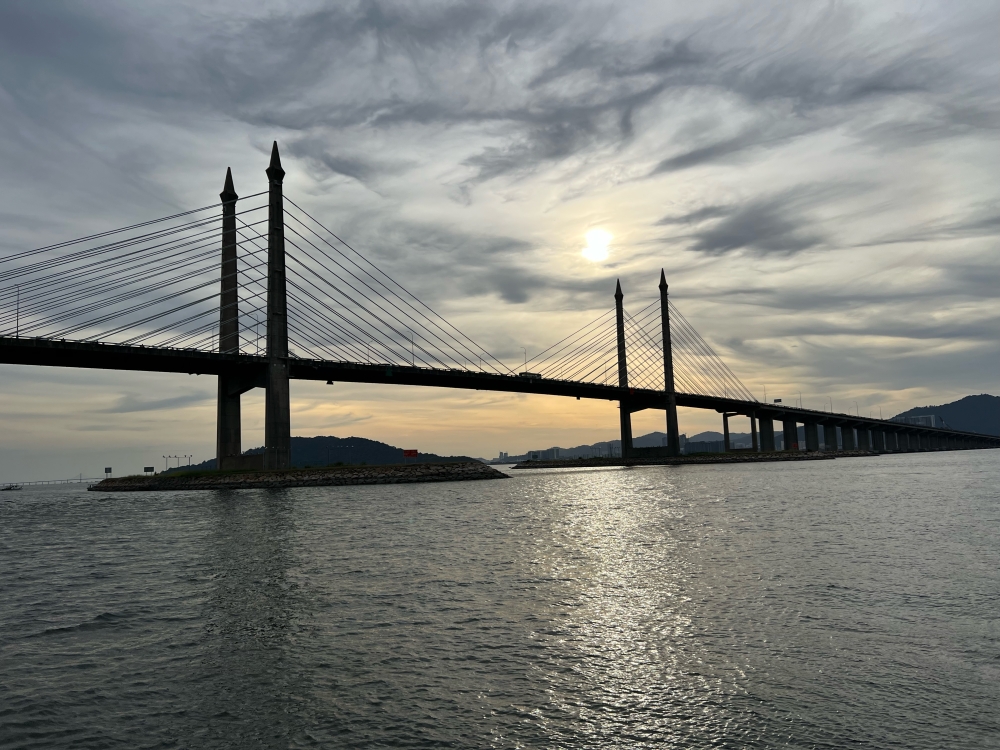 Passengers at the Penang Bridge Sunset Cruise will be able to catch breathtaking views of the bridge and the sunset from the ferry. — Picture by Opalyn Mok