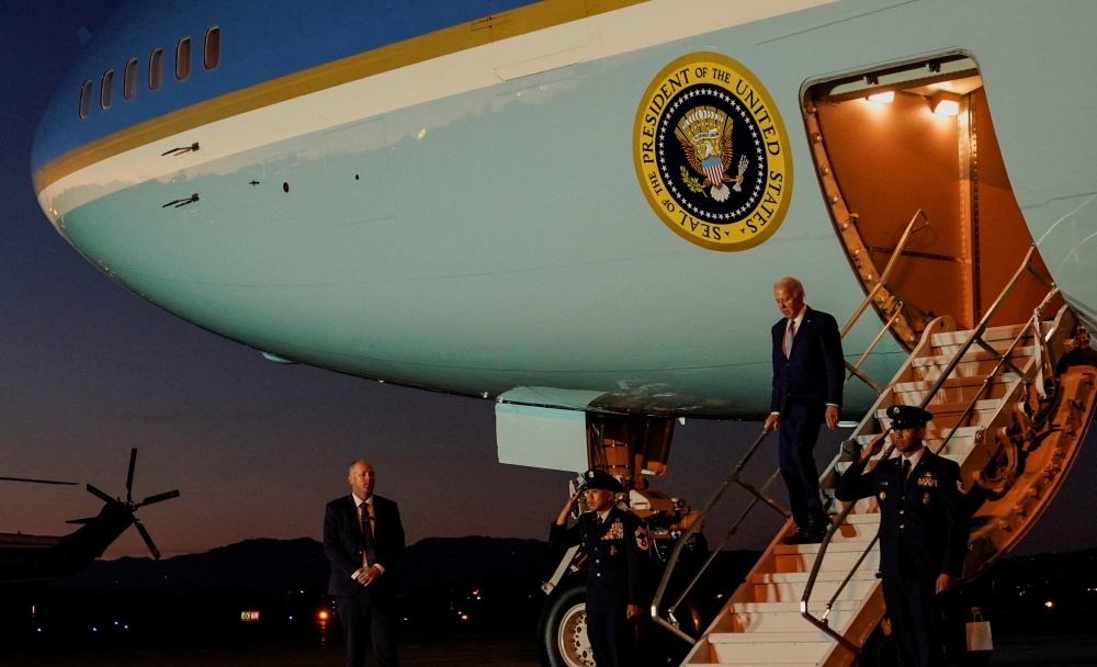 US President Joe Biden disembarks from Air Force One at Los Angeles International Airport in Los Angeles December 8, 2023. ― Reuters pic