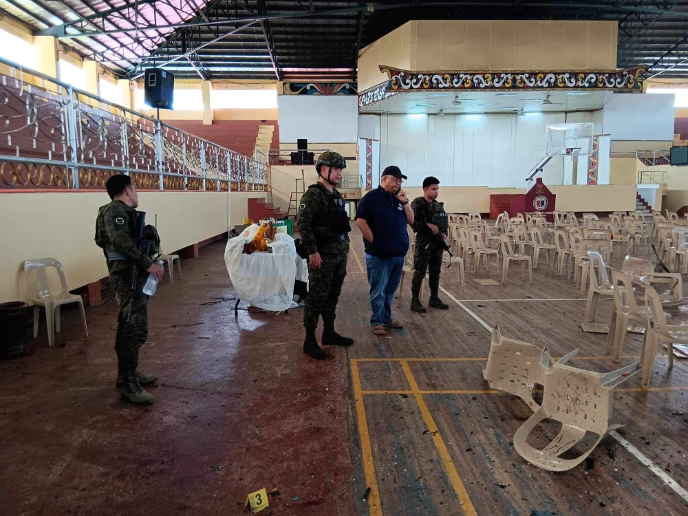 File photo of Lanao Del Sur Governor Mamintal Adiong Jr. looking on as law enforcement officers investigate the scene of an explosion that occurred during a Catholic Mass in a gymnasium at Mindanao State University in Marawi, Philippines, December 3, 2023. — Reuters pic