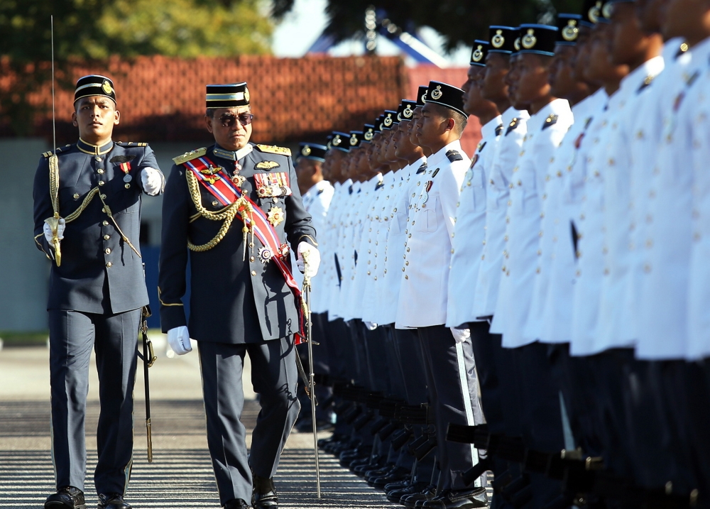 RMAF chief Gen Tan Sri Mohd Asghar Khan Goriman Khan performs a parade inspection after the presentation of pilot wings for the Basic Flight Course Series 84/22 and Basic Helicopter Flight Course Series 64/22 at the Air Force College in Alor Setar December 9, 2023. — Bernama pic 