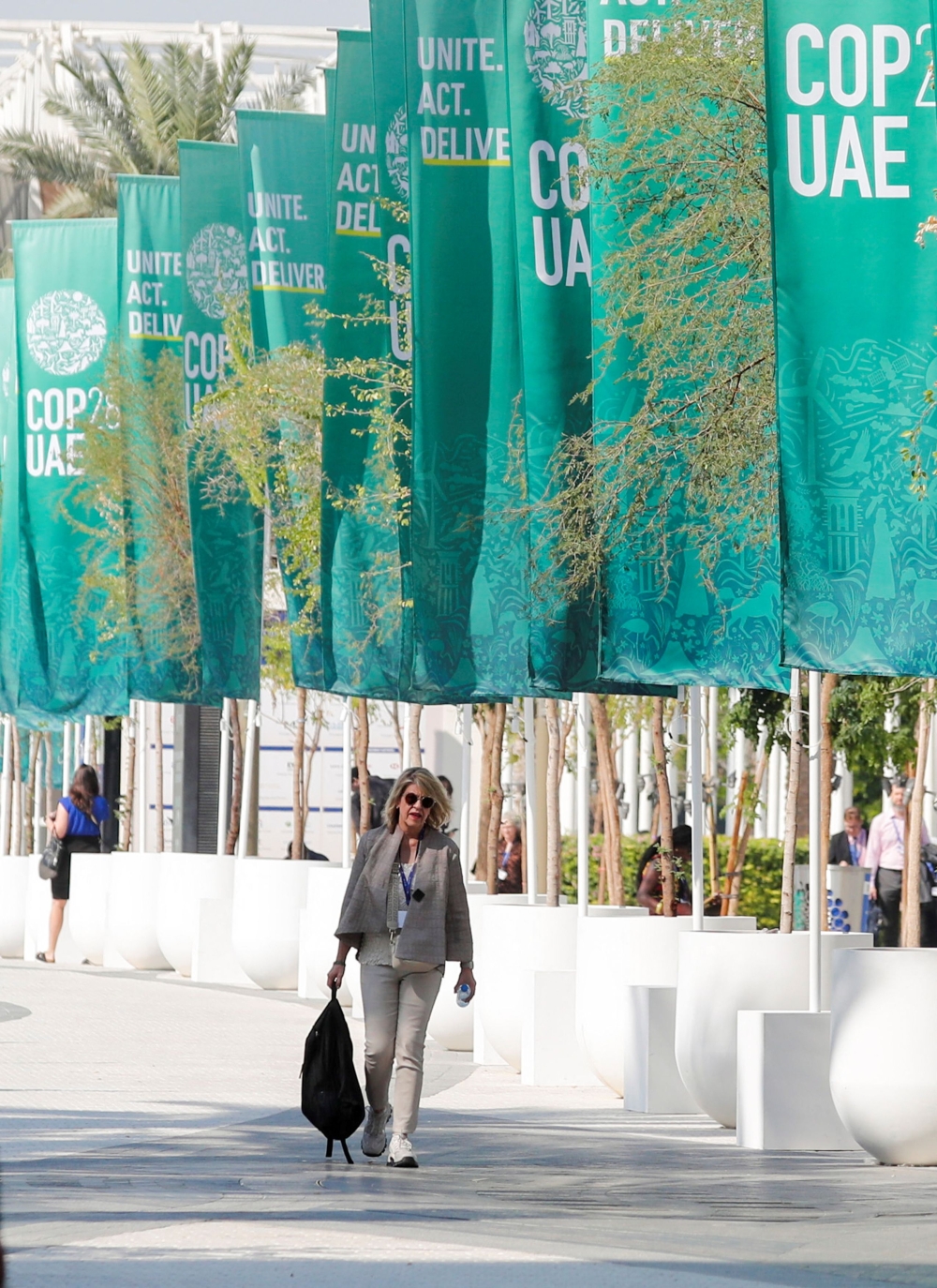 A delegate arrives at Dubai’s Expo City during the United Nations Climate Change Conference COP28 in Dubai, United Arab Emirates, December 9, 2023. — Reuters pic