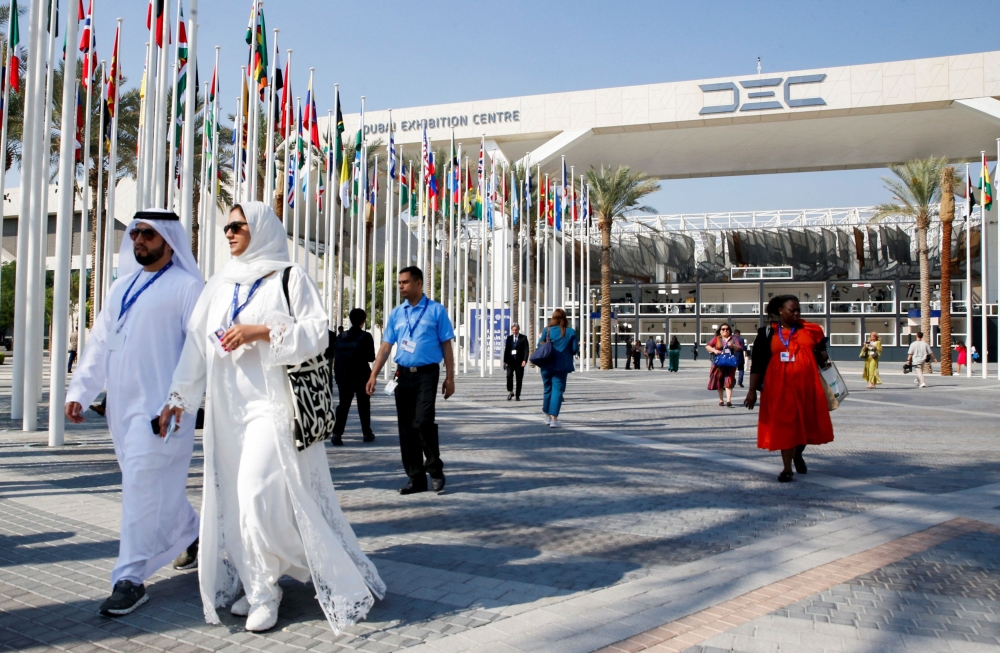 Delegates arrive at Dubai’s Expo City during the United Nations Climate Change Conference COP28 in Dubai, United Arab Emirates, December 9, 2023. — Reuters pic
