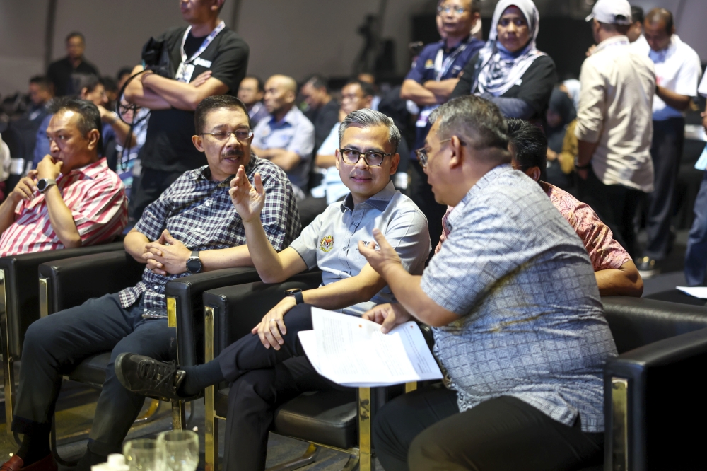 Minister of Communications and Digital, Fahmi Fadzil (second right) with Chief Secretary Tan Sri Mohd Zuki Ali (second, left) inspecting the final preparations for the closing ceremony of the Madani Government One Year Program at the main stage of the program at the Stadium Bukit Jalil National, December 9, 2023. — Bernama pic