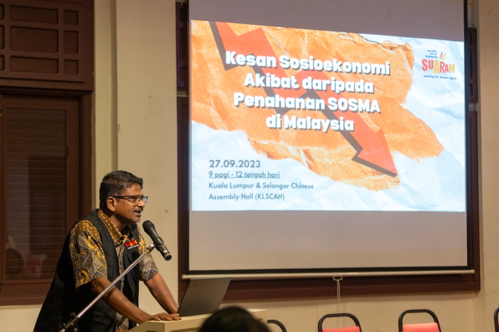 Suaram Executive Director Sevan Doraisamy addresses the audience during the launch of the Suaram report on the Socioeconomic Impact of Sosma Detention in Malaysia at Kuala Lumpur and Selangor Chinese Hall (KLSCAH) September 26, 2023. — Picture By Raymond Manuel
