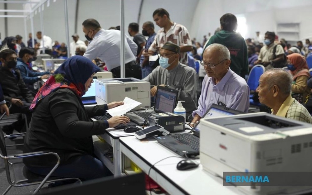 A total of 37,242 traffic summonses were settled in two days from Friday at counters set up in conjunction with the Madani Government One Year Anniversary Programme. — Picture via X/Bernama 