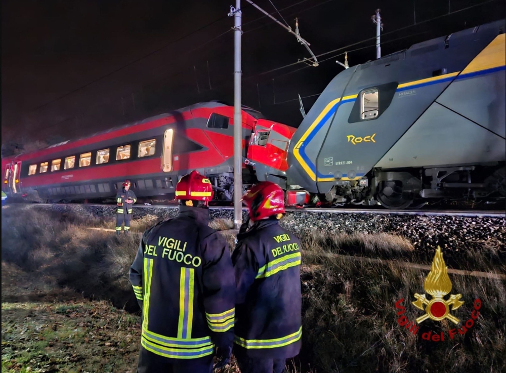Two trains crashed into each other at low speed in northern Italy late yesterday, injuring at least 17 people, none seriously, firefighters and the train operator said. — AFP Pic/Vigili del Fuoco handout