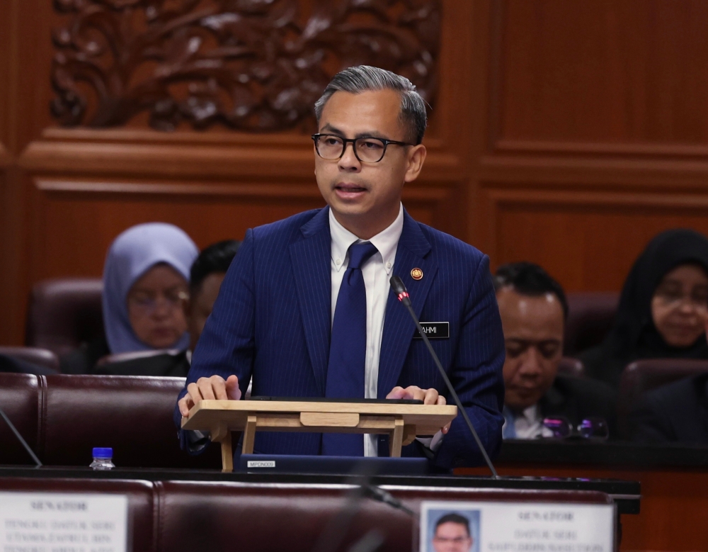 Minister of Communications and Digital Fahmi Fadzil speaking in Parliament, December 11, 2023. — Bernama pic