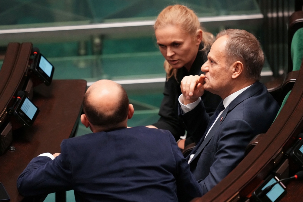 Leader of the Civic Coalition (KO) Donald Tusk looks on, on the day Poland's Prime Minister Mateusz Morawiecki presents his government's programme and asks parliament for a vote of confidence in Parliament in Warsaw, Poland, December 11, 2023. — Reuters pic