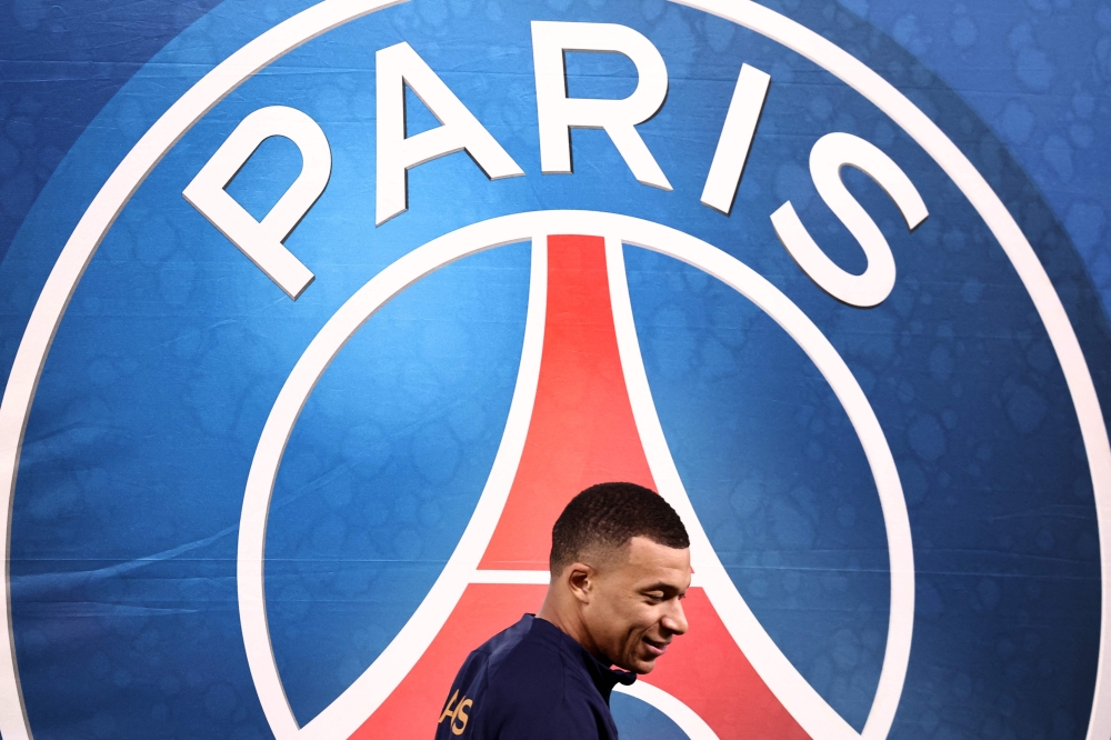 Paris Saint-Germain's French forward #07 Kylian Mbappe arrives for the French L1 football match between Paris Saint-Germain (PSG) and Nantes at the Parc des Princes stadium on December 9, 2023 in Paris. — AFP pic