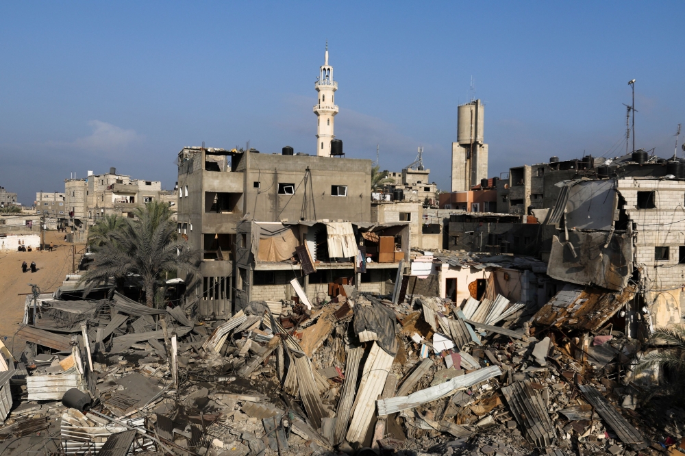 A view of debris in the aftermath of Israeli strikes on houses, amid the ongoing conflict between Israel and the Palestinian Islamist group Hamas, in Khan Younis in the southern Gaza Strip, December 12, 2023. — Reuters pic  