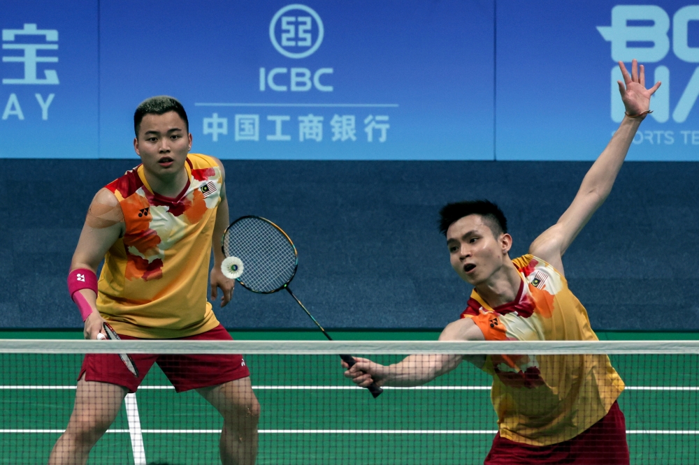 Both pairs looked equally matched initially as they were tied at 5-5 but world number three Aaron Chia-Soh Wooi Yik failed to maintain their consistency and this allowed the Japanese pair to romp home 21-16 in the first game. — Bernama pic 