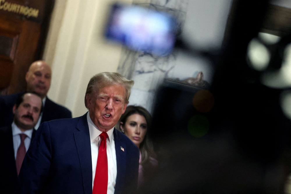 Donald Trump cannot assert presidential immunity from a defamation lawsuit by writer E. Jean Carroll, who accused him of rape, a US appeals court ruled today, dealing the former US president another legal setback. — Reuters pic  