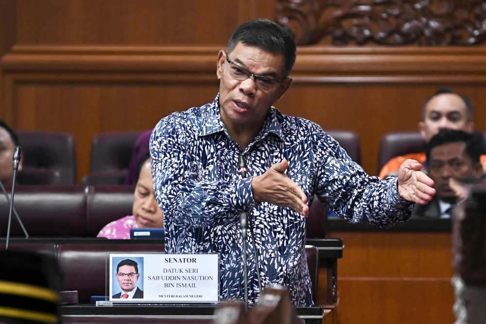 Home Minister Datuk Seri Saifuddin Nasution Ismail speaks during a question-and-answer session at the Dewan Negara December 14, 2023. ― Bernama pic