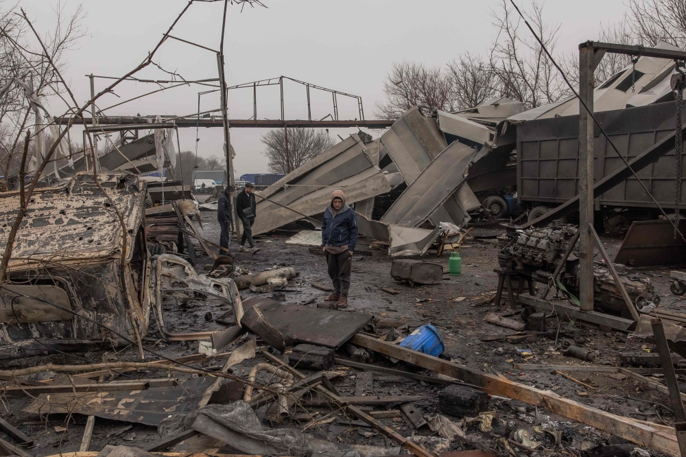 A man looks around a destroyed hangar following a Russian attack in Odesa, on December 13, 2023, amid the Russian invasion of Ukraine. — AFP pic