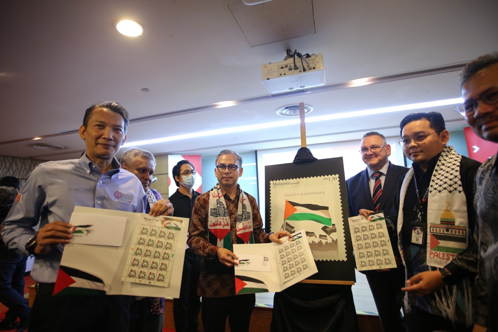 The stamp set, named ‘Palestin Merdeka’, will be available in all Pos Malaysia branches starting January 18 next year. — Picture by Ahmad Zamzahuri